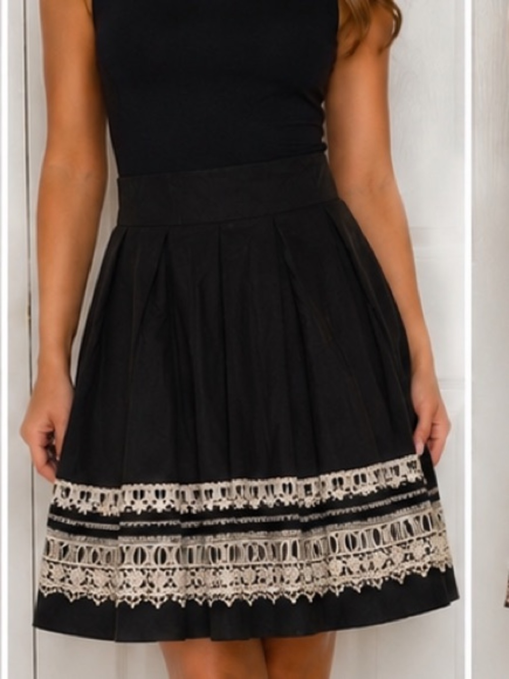 New York & Company Black Skirt with White Lace Trim Detailing
100%cotton